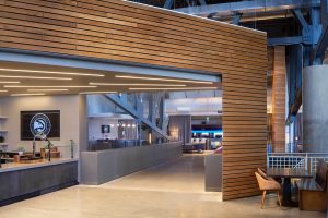 Wood-paneled wall and lounge area in State Farm Arena in Atlanta, GA