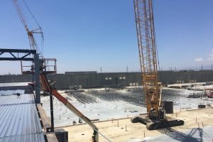 Cranes used to install metal decking installation at Goodman Commerce Center Eastvale in Southern California.